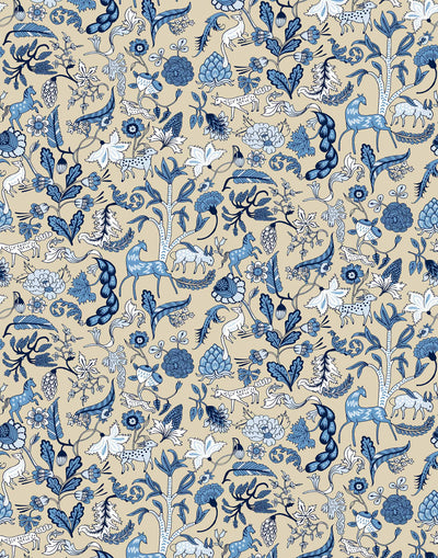 Foret (Cornflower) features magical animals and flowers in shades of blue on cream designed by Julia Rothman