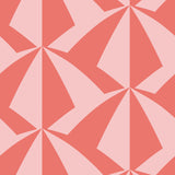 Parasol wallpaper is designed with overlapping shapes of multicolored beach umbrellas. Highly durable, fade resistant, and made in the USA. This wallpaper has a coral print on a pink background and is designed in collaboration with The Aesthetics of Joy.