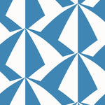 Parasol wallpaper is designed with overlapping shapes of multicolored beach umbrellas. Highly durable, fade resistant, and made in the USA. This wallpaper has a blue print on a white background and is designed in collaboration with The Aesthetics of Joy.
