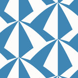 Parasol wallpaper is designed with overlapping shapes of multicolored beach umbrellas. Highly durable, fade resistant, and made in the USA. This wallpaper has a blue print on a white background and is designed in collaboration with The Aesthetics of Joy.