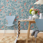 Our Heirloom wallpaper celebrates the annual arrival of tomato season. Highly durable, fade resistant, and made in the USA. This wallpaper features red and peach tomatoes, pink flowers and blue vines on a light blue background and was created in collaboration with The Aesthetics of Joy.