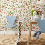 Our Heirloom wallpaper celebrates the annual arrival of tomato season. Highly durable, fade resistant, and made in the USA. This wallpaper features red and pink tomatoes, yellow flowers and green vines on a pink background and was created in collaboration with The Aesthetics of Joy.