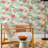 Our Lanai wallpaper is inspired by the rich tradition and exuberant patterns of Hawaiian shirts, with a twist. Highly durable, fade resistant, and made in the USA. This wallpaper features red flowers with green and blue leaves on a cream background and was created in collaboration with The Aesthetics of Joy.