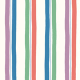 Our Picnic wallpaper was inspired by the wavy stripes of a picnic blanket. Highly durable, fade resistant, and made in the USA. This wallpaper has green, blue, red and purple stripes on a white background and was made in collaboration with The Aesthetics of Joy.