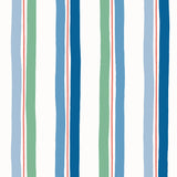 Our Picnic wallpaper was inspired by the wavy stripes of a picnic blanket. Highly durable, fade resistant, and made in the USA. This wallpaper has blue and green stripes on a white background and was made in collaboration with The Aesthetics of Joy.