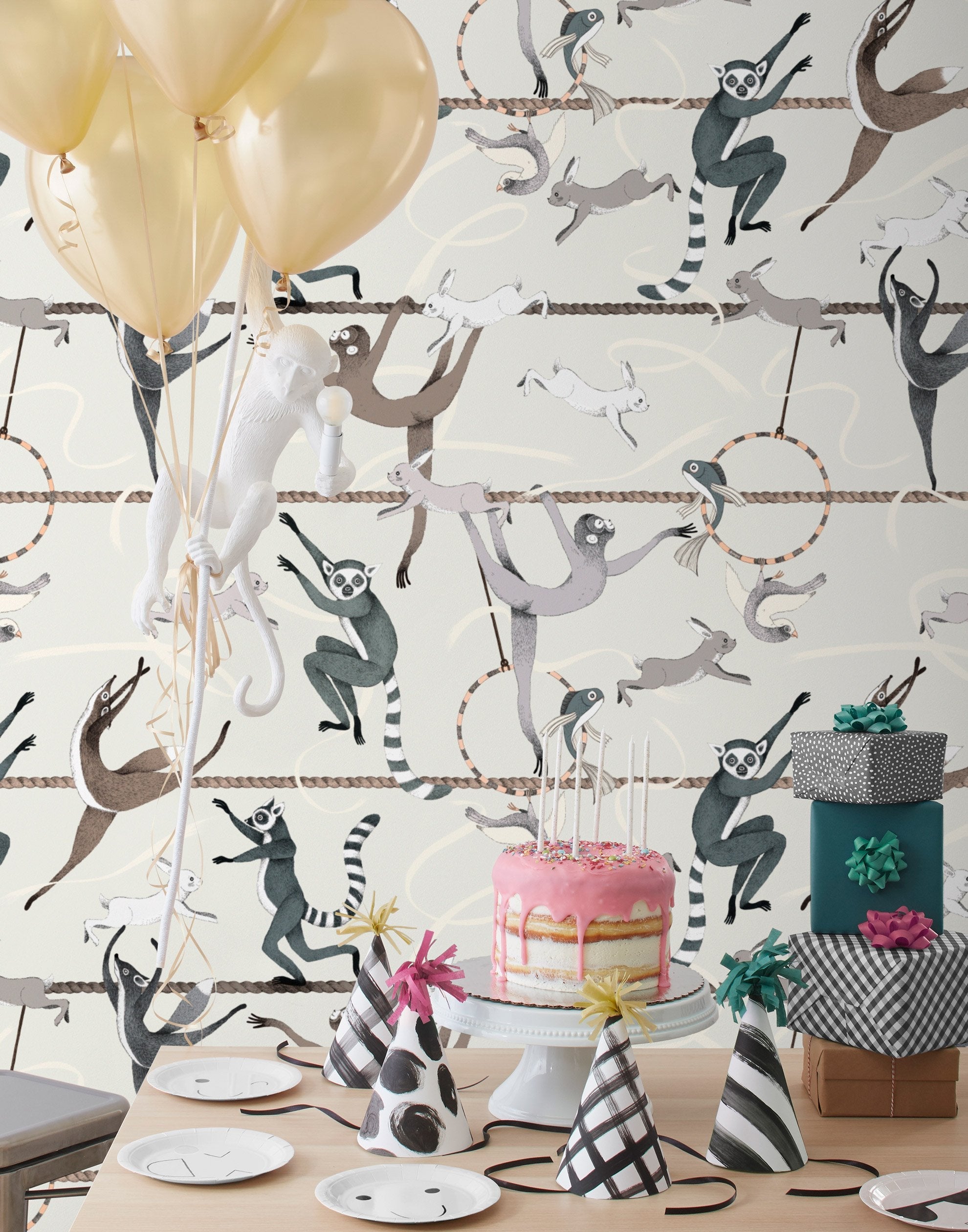 Balancing Act (Cream) wallpaper features colorful dancing monkeys and rabbits on a cream background
