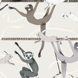Balancing Act (Cream) wallpaper features colorful dancing monkeys and rabbits on a cream background
