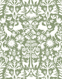 Folklore (Fern) features white animals and flowers in a mirroring pattern on a soft green backgroud designed by Emily Isabella for Hygge & West