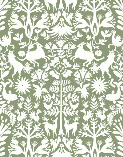 Folklore (Fern) features white animals and flowers in a mirroring pattern on a soft green backgroud designed by Emily Isabella for Hygge & West