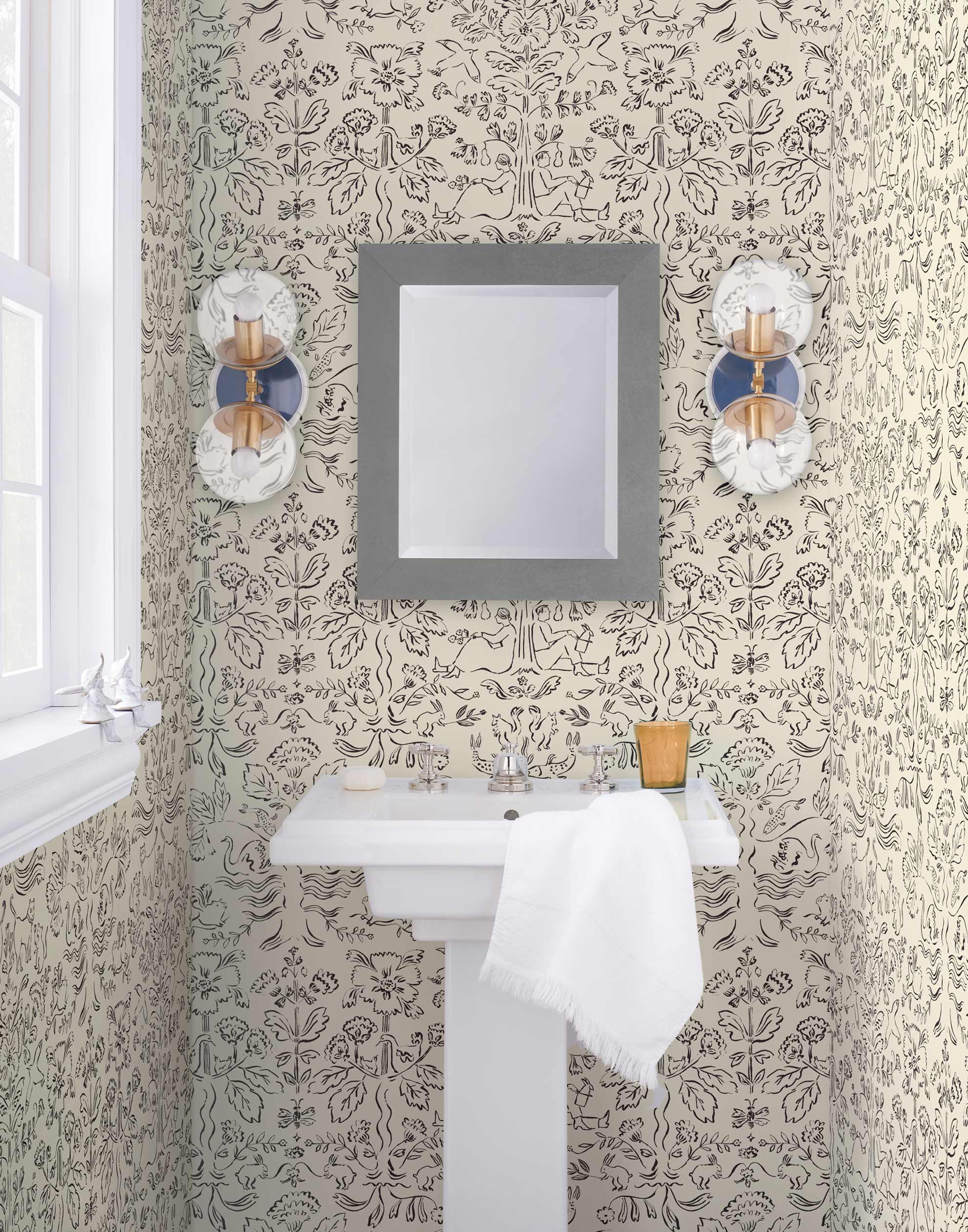 Storyline (Parchment) Wallpaper | Folk art inspired pattern featuring flora and fauna in black on a parchment ground