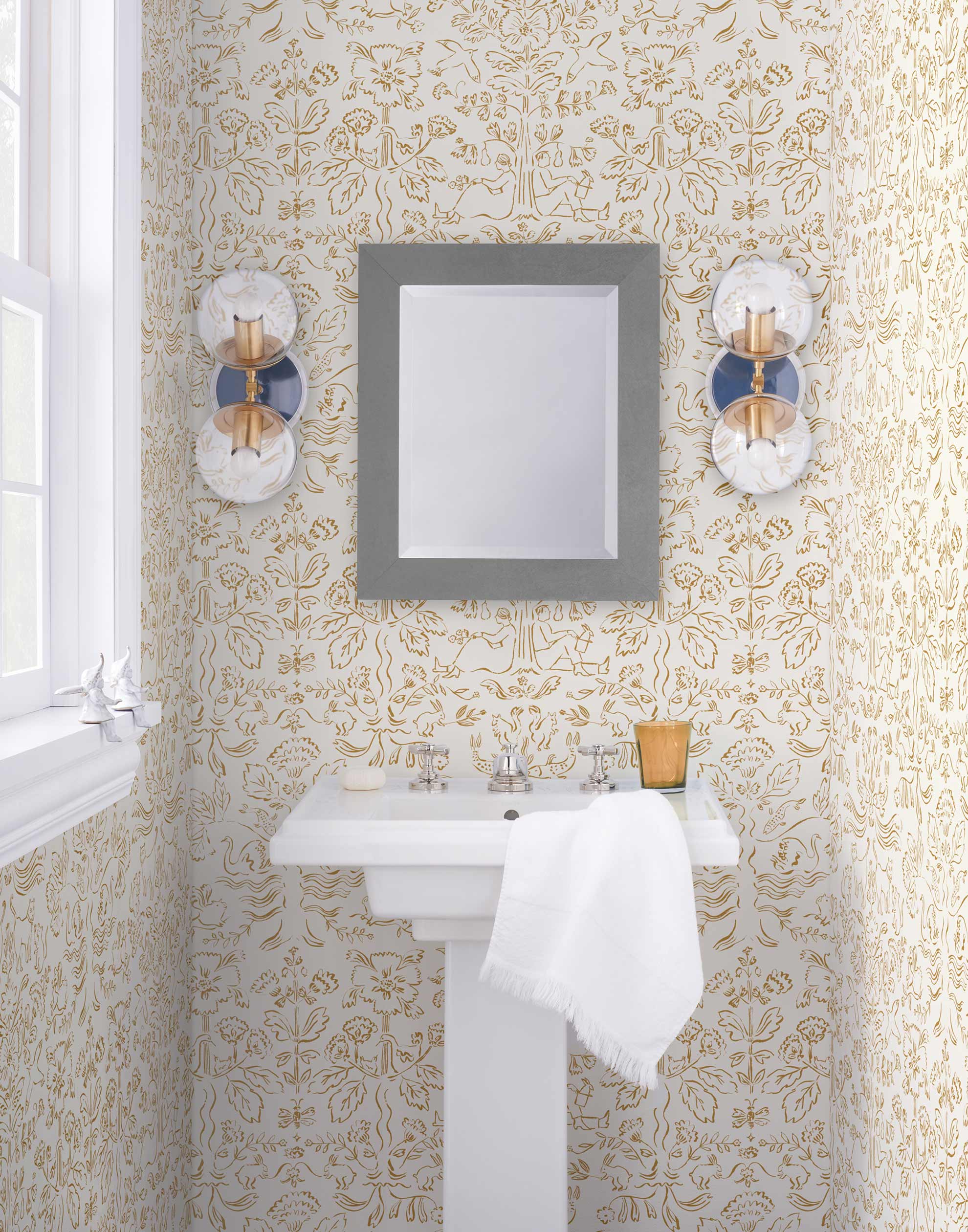 Storyline (Goldenrod) Wallpaper | Folk art inspired pattern featuring flora and fauna in ochre yellow on a white ground