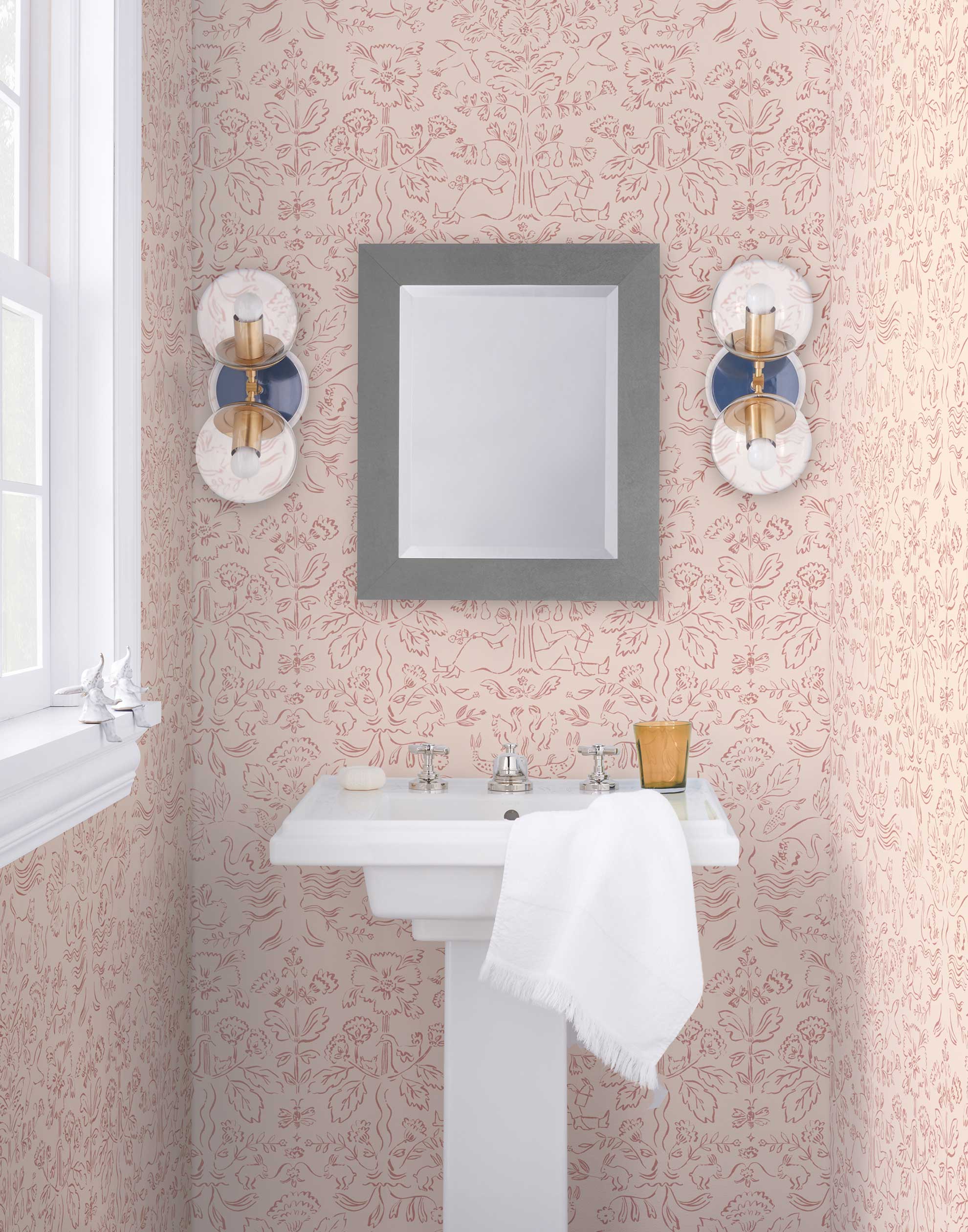 Storyline (Blush) Wallpaper | Folk art inspired pattern featuring flora and fauna in dusty pink on a soft pink ground