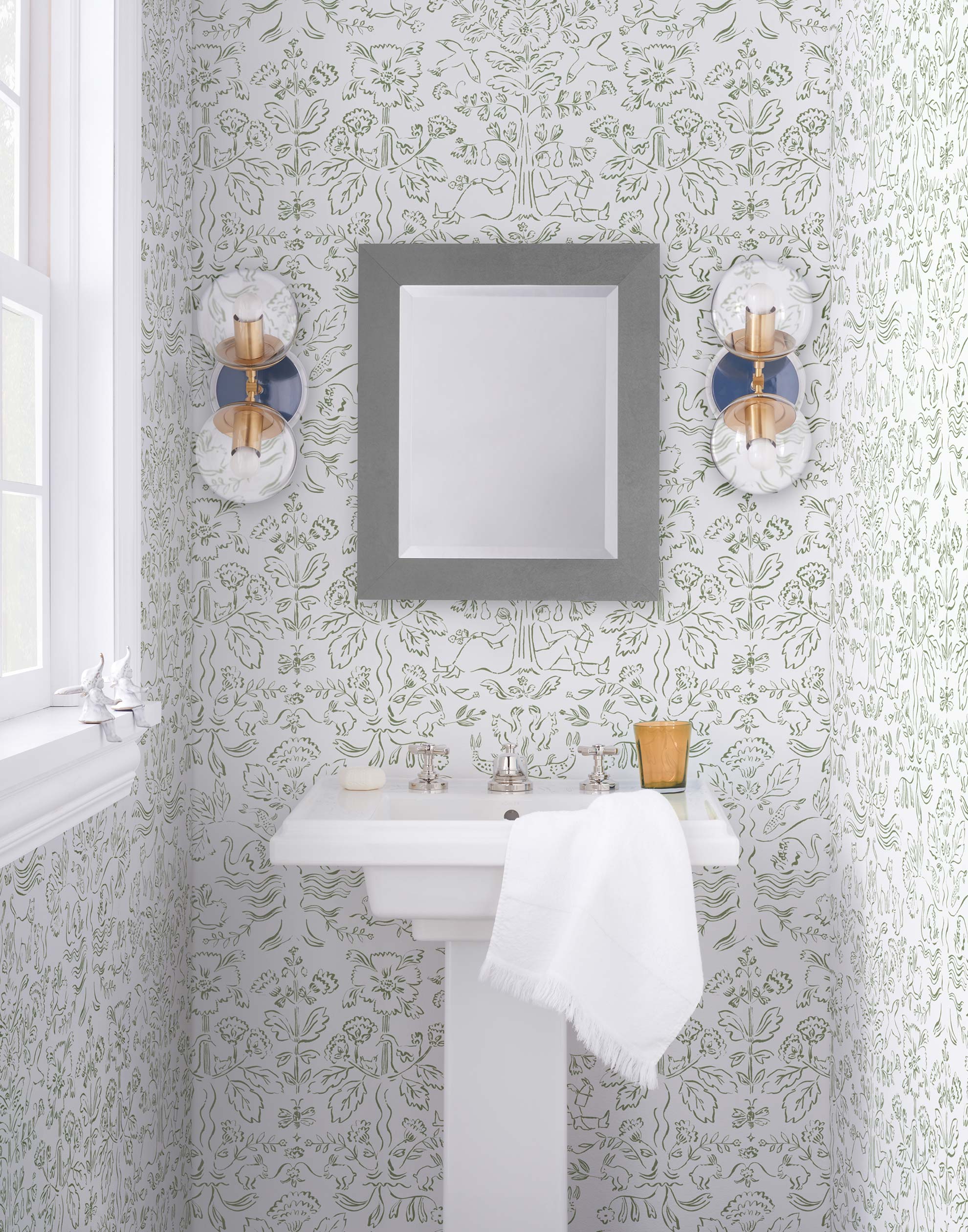 Storyline (Sage) Wallpaper | Folk art inspired pattern featuring flora and fauna in sage green on a soft gray ground