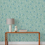 Bloom (Mist) Wallpaper featuring turquoise dots and green stems on a mist blue ground in a modern, graphic floral 