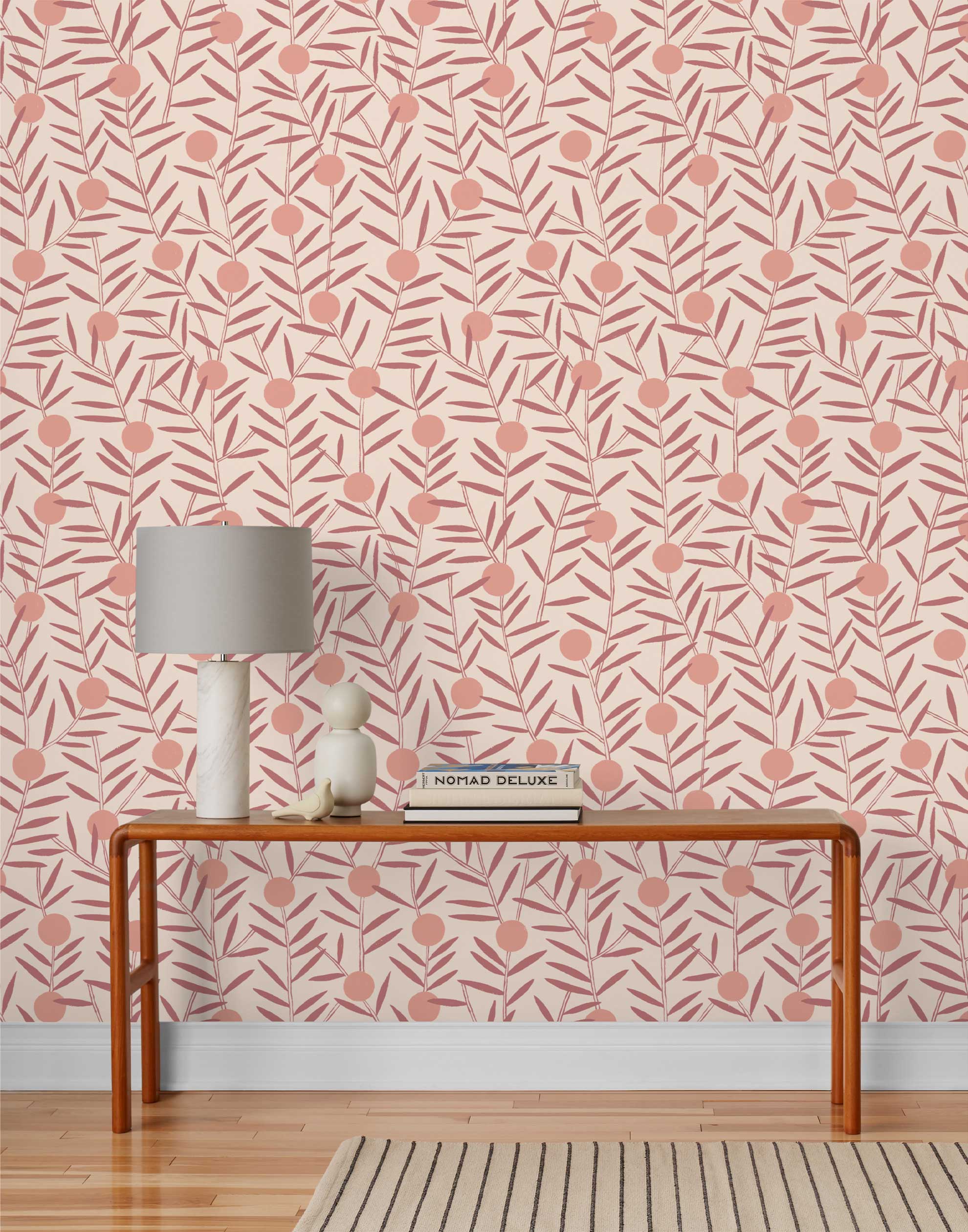 Bloom (Blush) Wallpaper featuring peach dots and mauve stems on a soft pink ground in a modern, graphic floral