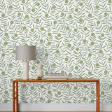 Bloom (Sage) Wallpaper featuring green dots and stems on an off white ground in a modern, graphic floral