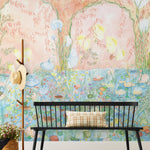 Watercolored swans, turtles, frogs, and fish swim in a flora filled pond beneath an arch of climbing plants and grasses. Lily Pond Mural contains a rainbow of soft watercolors - yellow, peach, apricot, green and blue. Hillery Sproat + Hygge & West