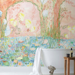 Watercolored swans, turtles, frogs, and fish swim in a flora filled pond beneath an arch of climbing plants and grasses. Lily Pond Mural contains a rainbow of soft watercolors - yellow, peach, apricot, green and blue. Hillery Sproat + Hygge & West