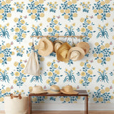 This large-scale wallpaper features hand drawn bees, butterflies and other garden friends frolic among flowers - camellias, hellebores, irises, and snowball trees. Harmony (Flax) is printed in shades of green and yellow on an off white background.