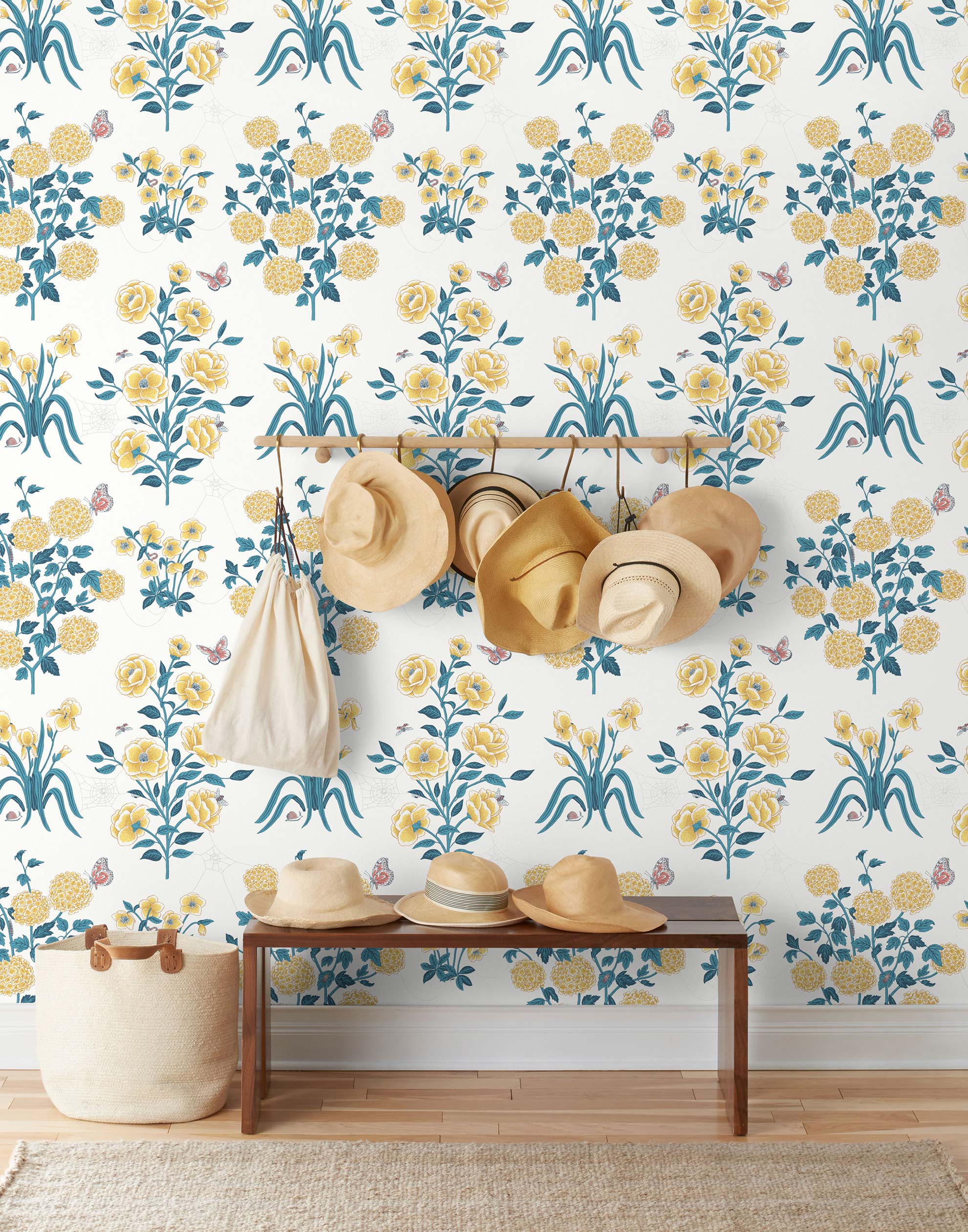 This large-scale wallpaper features hand drawn bees, butterflies and other garden friends frolic among flowers - camellias, hellebores, irises, and snowball trees. Harmony (Flax) is printed in shades of green and yellow on an off white background.