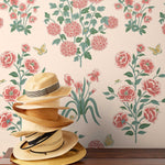 This large-scale wallpaper features hand drawn bees, butterflies and other garden friends frolic among flowers - camellias, hellebores, irises, and snowball trees. Harmony (Blush) is printed in shades of green and pink on a blush background.