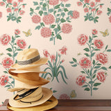 This large-scale wallpaper features hand drawn bees, butterflies and other garden friends frolic among flowers - camellias, hellebores, irises, and snowball trees. Harmony (Blush) is printed in shades of green and pink on a blush background.