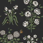 This large-scale wallpaper features hand drawn bees, butterflies and other garden friends frolic among flowers - camellias, hellebores, irises, and snowball trees. Harmony (Ebony) is printed in shades of green and white on a black background.