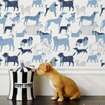 Find your favorite furry friend in our Dog Park pattern, designed in collaboration with Julia Rothman. This wallpaper features blue and navy dogs on a white background.