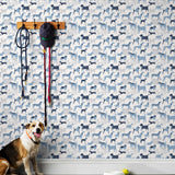 Find your favorite furry friend in our Dog Park pattern, designed in collaboration with Julia Rothman. This wallpaper features blue and navy dogs on a white background.