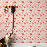 Find your favorite furry friend in our Dog Park pattern, designed in collaboration with Julia Rothman. This wallpaper features red and pink dogs on an off white background.