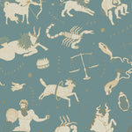 Our In the Stars wallpaper is inspired by Urania’s Mirror, a 19th-century set of astrology charts. This hand-drawn pattern evokes the mysterious motion of celestial bodies. This wallpaper features cream and gold motifs on a blue background and was designed by Julia Rothman.