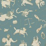 Our In the Stars wallpaper is inspired by Urania’s Mirror, a 19th-century set of astrology charts. This hand-drawn pattern evokes the mysterious motion of celestial bodies. This wallpaper features cream and gold motifs on a blue background and was designed by Julia Rothman.