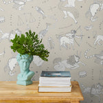 Our In the Stars wallpaper is inspired by Urania’s Mirror, a 19th-century set of astrology charts. This hand-drawn pattern evokes the mysterious motion of celestial bodies. This wallpaper features white and black motifs on a cream background and was designed by Julia Rothman.