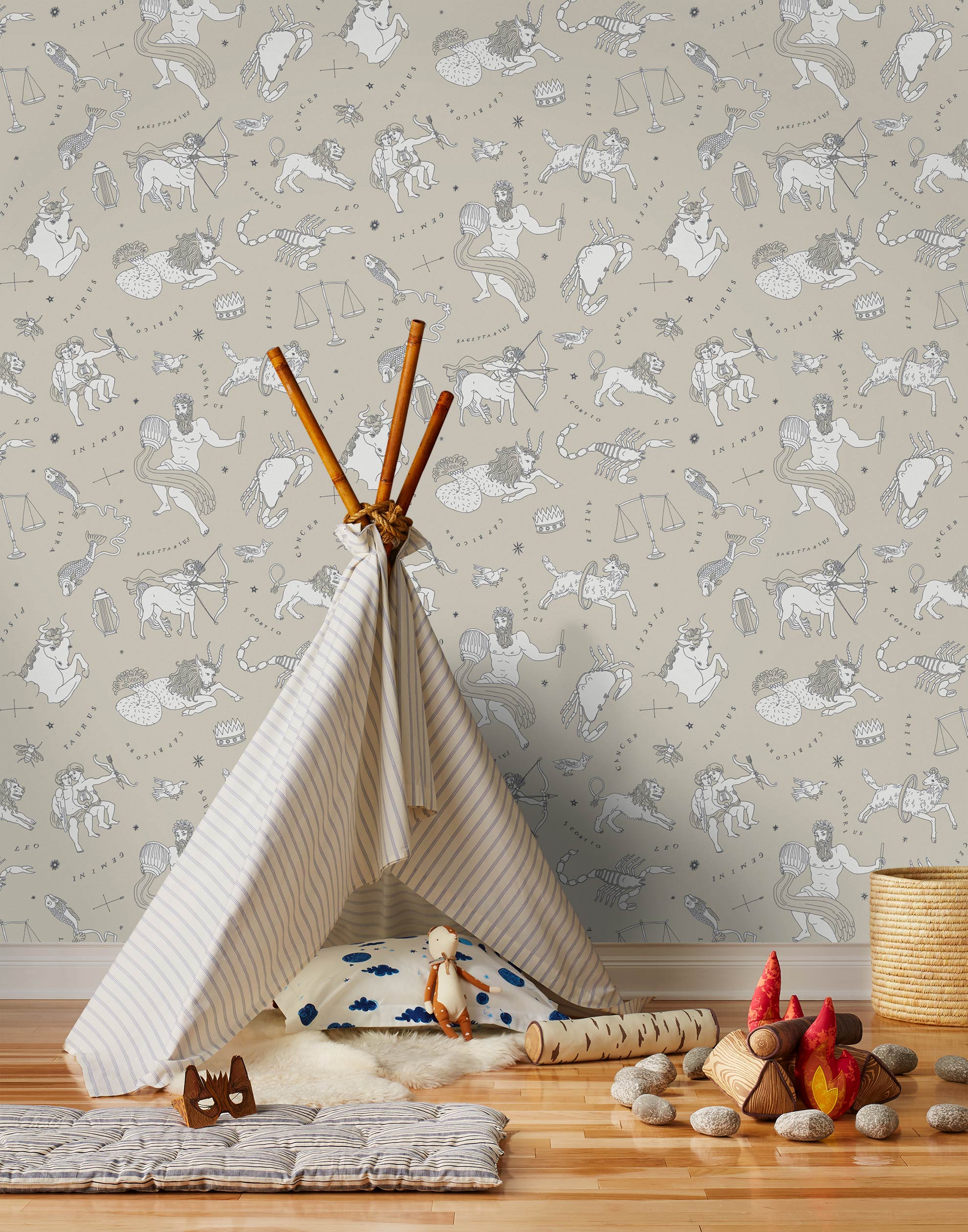 Our In the Stars wallpaper is inspired by Urania’s Mirror, a 19th-century set of astrology charts. This hand-drawn pattern evokes the mysterious motion of celestial bodies. This wallpaper features white and black motifs on a cream background and was designed by Julia Rothman.