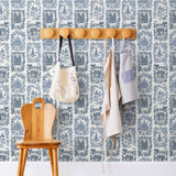 Je T'aime Paris (Porcelain) wallpaper featuring blue illustrations of Paris landmarks on a white background | Nathalie Lete + Hygge & West