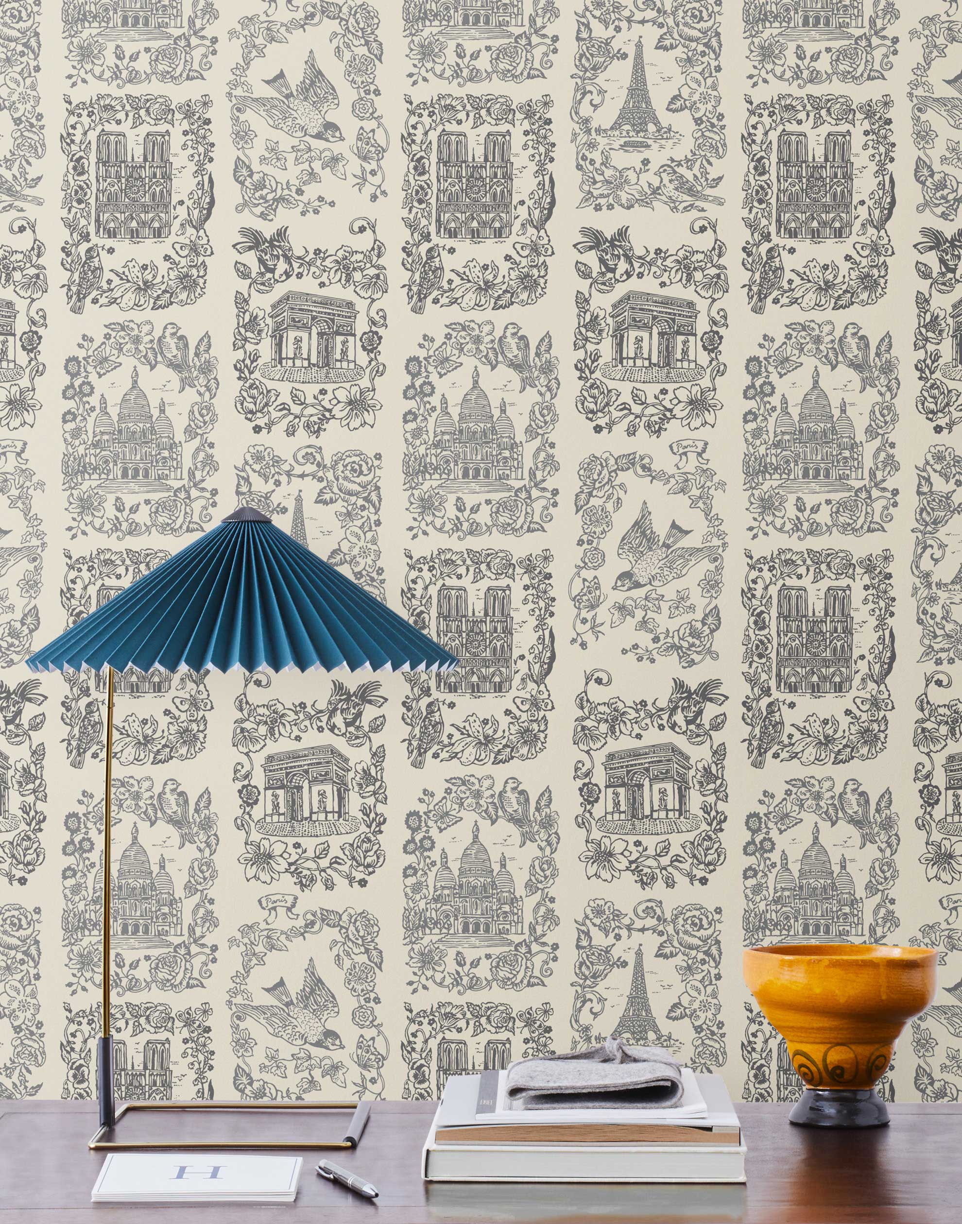 Je T'aime Paris (Parchment) wallpaper featuring gray illustrations of Paris landmarks on a cream background | Nathalie Lete + Hygge & West