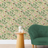 Robin (Parchment) features red-breasted robins hopping among leaves in shades of green on a cream backround.