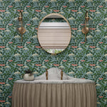 Featuring vibrant blossoms set against lush foliage, the elderberry plant is the inspiration for this wallpaper. Elder (Sky) is printed with pink and white flowers and green leaves on a blue background.