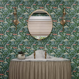 Featuring vibrant blossoms set against lush foliage, the elderberry plant is the inspiration for this wallpaper. Elder (Sky) is printed with pink and white flowers and green leaves on a blue background.