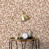 Olive Grove (Bellini) featuring a leafy vine motif in shades of rust and pink with green accents on an off white background | Schoolhouse x Hygge & West Wallpaper Collection