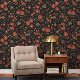 Cascade Meadow (Ebony) featuring hand drawn flowers in red and gold on a black background | Schoolhouse x Hygge & West