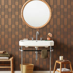 Wallpaper with undulating copper lines that form rhythmic columns on a dark gray background | Schoolhouse + Hygge & West