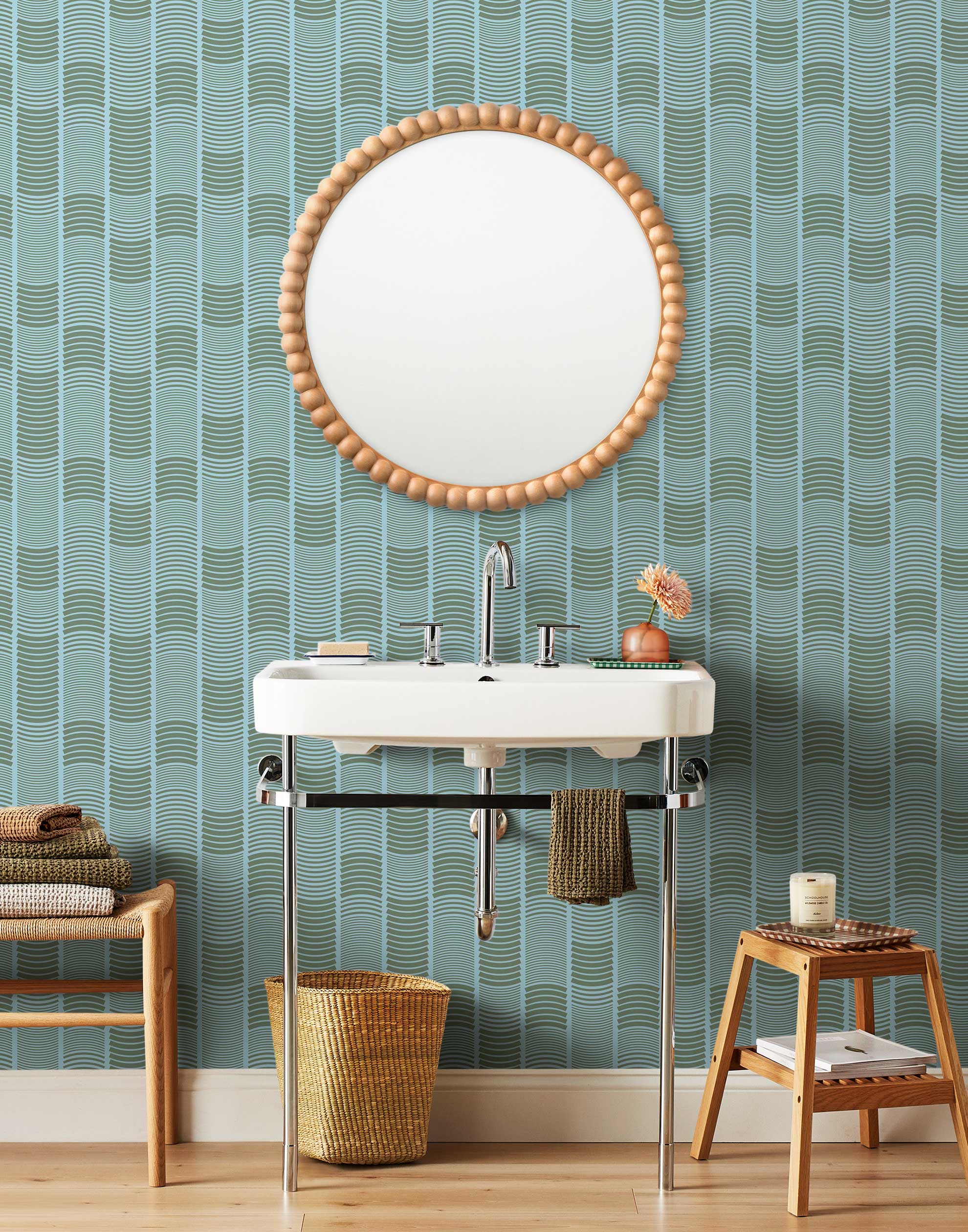 Wallpaper with undulating green lines that form rhythmic columns on a blue background | Schoolhouse + Hygge & West