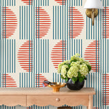 Wallpaper with irregular line work that weaves blue rectangles and red semicircles on an off white background | Schoolhouse + Hygge & West