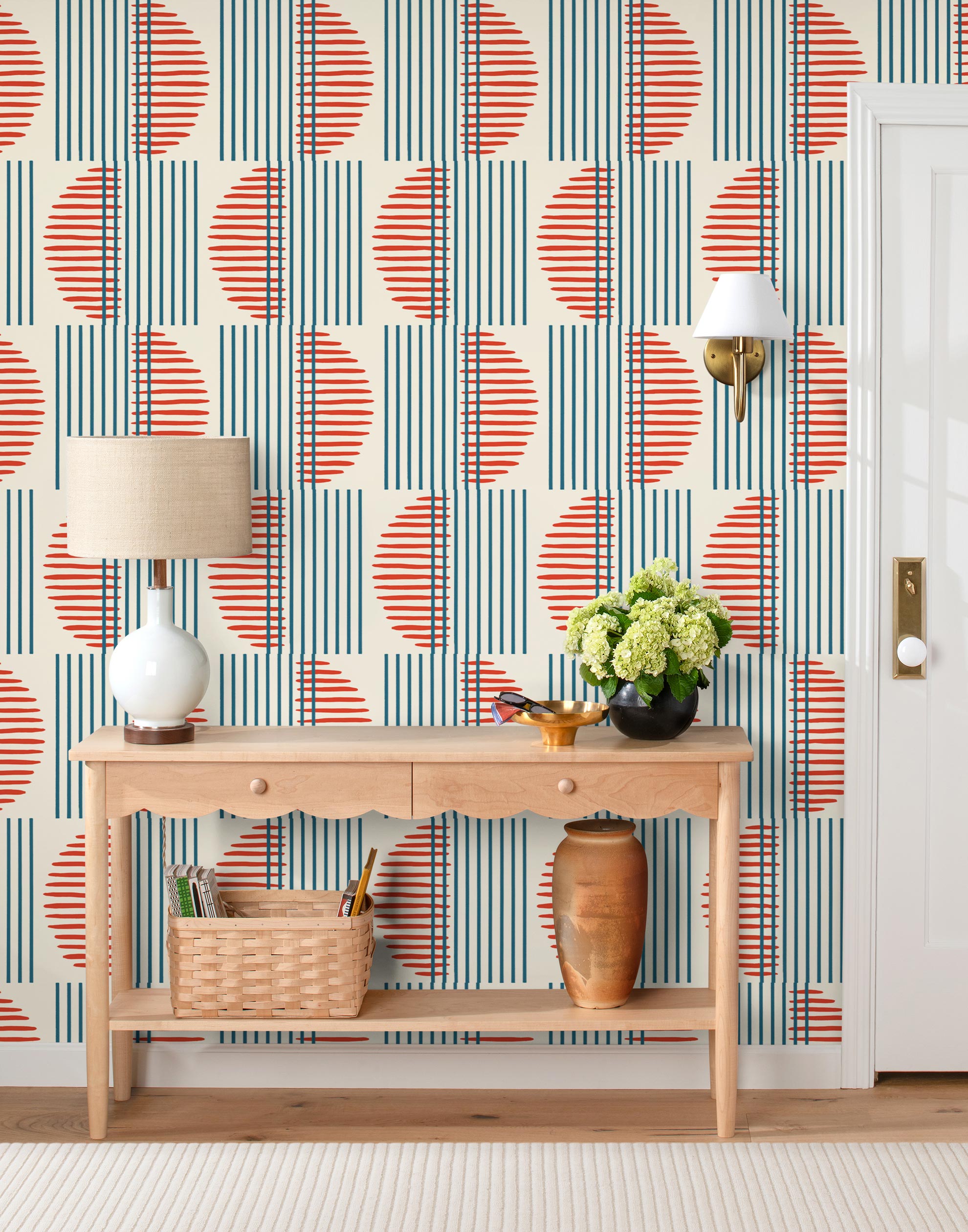 Wallpaper with irregular line work that weaves blue rectangles and red semicircles on an off white background | Schoolhouse + Hygge & West