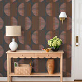 Wallpaper with irregular line work that weaves copper rectangles and pink semicircles on a deep gray background | Schoolhouse + Hygge & West