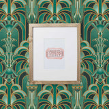 Drawing inspiration from the iconic Emerald City in Wicked, this wallpaper features a mesmerizing blend of deep greens and golds, evoking a sense of magical grandeur. The intricate geometric design mixed with hot air balloons and flying monkeys brings the enchantment of the city into your home.