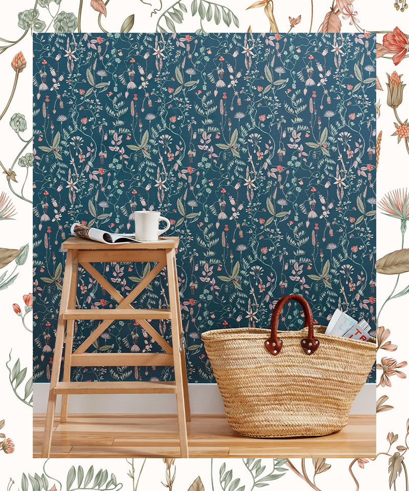 Learn how to apply pre-pasted wallpaper with Sonoma in White and Indigo colors in a room with a tote bag, stool, coffee, and magazine