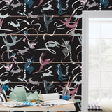 Balancing Act (Ebony) wallpaper features colorful dancing monkeys and rabbits on a black background