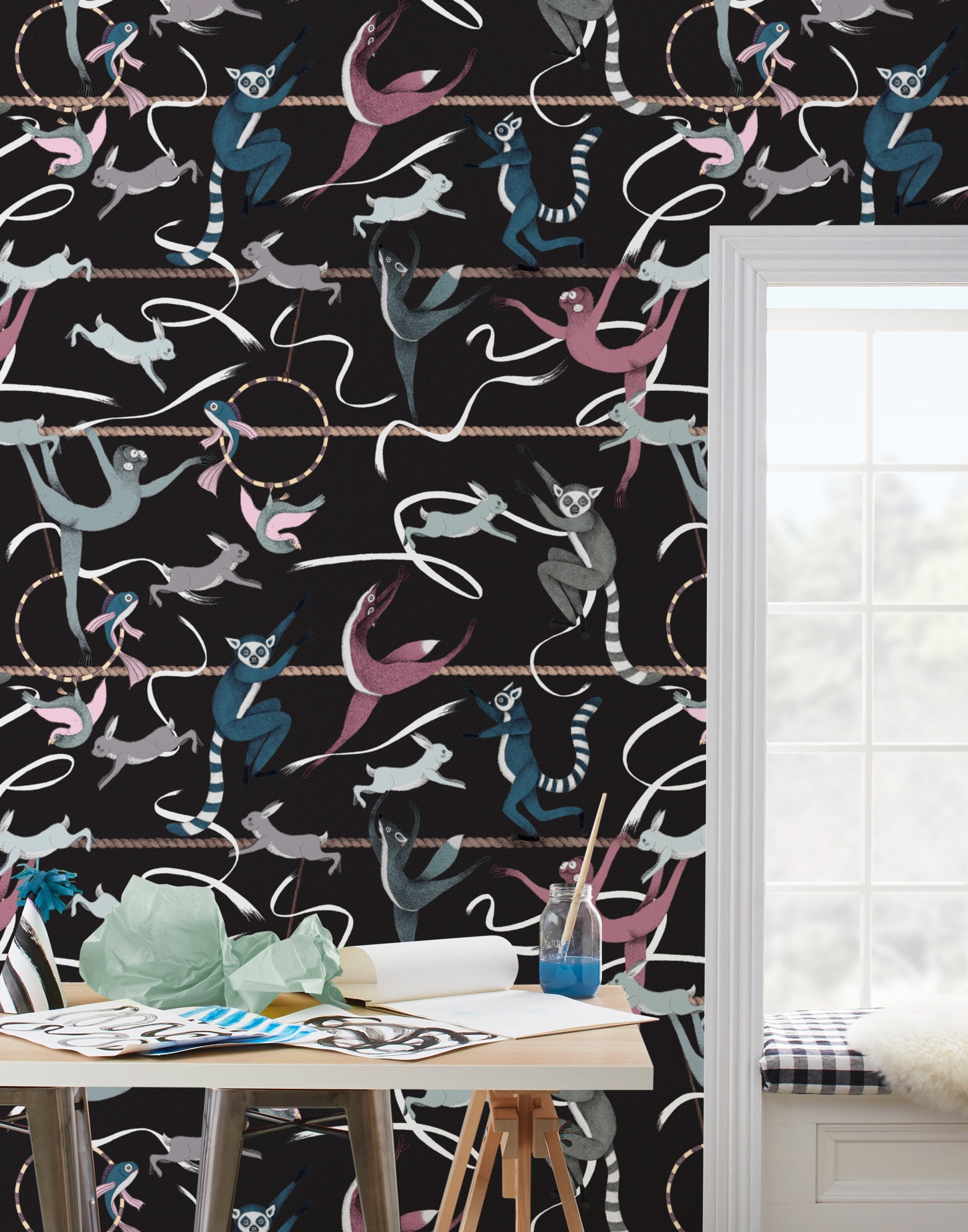Balancing Act (Ebony) wallpaper features colorful dancing monkeys and rabbits on a black background